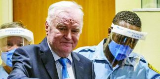 Ex-Bosnian Serb military chief Ratko Mladic arrives in the courtroom prior to the hearing of the final verdict on appeal against his genocide conviction over the 1995 Srebrenica massacre. Mladic has been in detention since 2011 and lost his appeal 10 years later. AFP VIA GETTY IMAGES