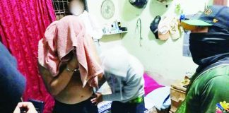 Police operatives performed a body search on alias “JR” during an anti-illegal drugs operation in Barangay Bakhaw, Mandurriao, Iloilo City on May 18. The suspect yielded around P1.5 million worth of suspected shabu. ICPO PHOTO
