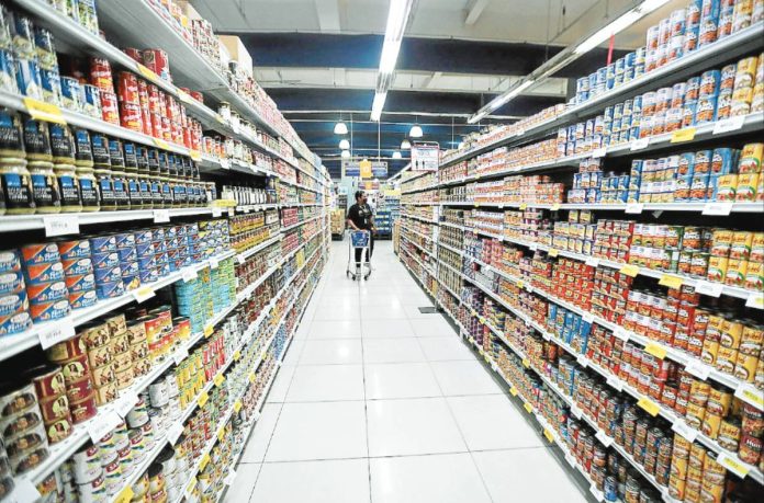basic goods While the prices of 68 percent of the basic necessities and prime commodities monitored by the Department of Trade and Industry have remained stable, several manufacturers have already informed the agency of plans to raise prices. INQUIRER FILE PHOTO