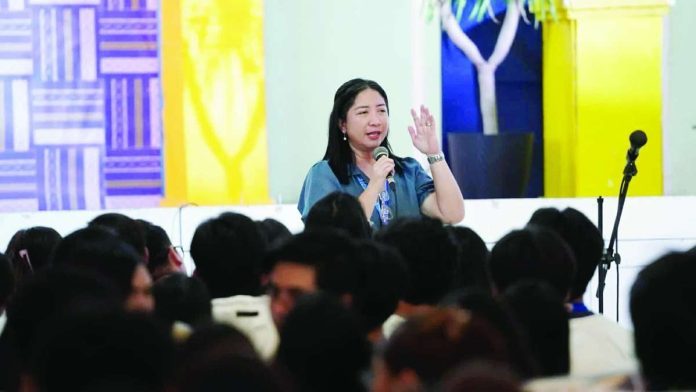Iloilo City Public Information Officer Ma. Lucy M. Sinay talks about Social Media Ethics and Digital Responsibility during the “Guardians of Truth: Youth Forum on Information Integrity, Digital Responsibility, and Social Media Civility,” on May 25, 2026.