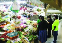 PH among top 50 economies at risk of food price surge A vegetable vendor at the Iloilo Terminal Market in Iloilo City tends to her customers. AL PALCULLO/PN