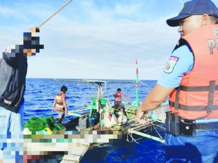 illegal_fishing_compressed_resized This motorboat is among the 14 vessels caught illegally fishing in the waters of Iloilo Province’s 5th District. PHOTO COURTESY OF IPPO