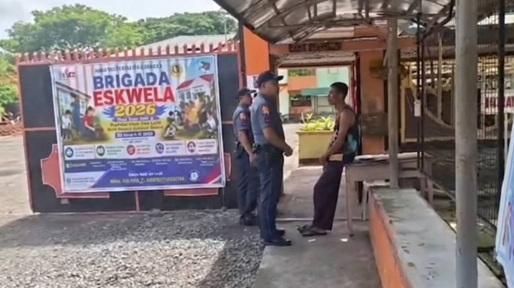 Photo shows officers of the Mina police station visiting Mina National High School in Barangay Bangac, Mina, Iloilo to boost police visibility and ensure the safety of students and campus personnel. MINA PNP PHOTO
