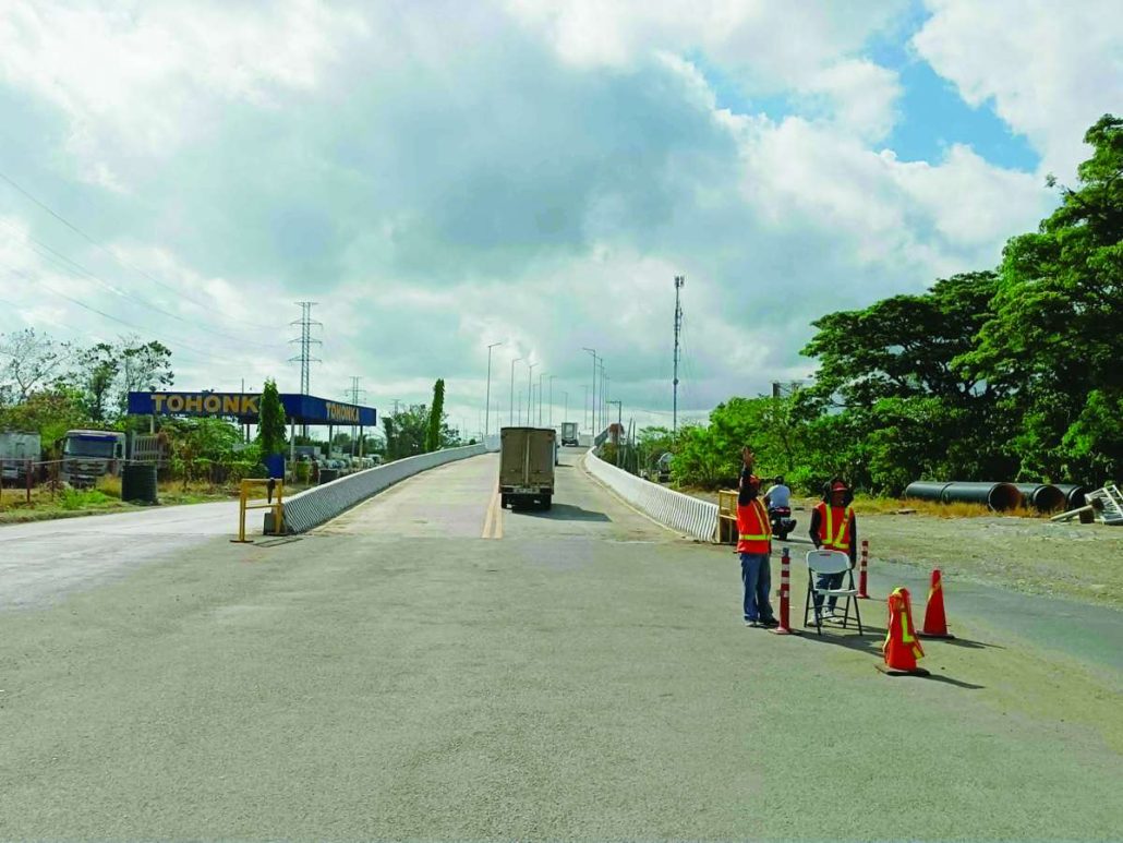 The Buhang Flyover in Jaro, Iloilo City is left without its height clearance barrier after an oversized wingvan crashed into the structure on the night of May 2, 2026 knocking down the metal frame that once warned overheight vehicles. The damaged clearance assembly now lies dismantled beside the roadway, while traffic enforcers tighten monitoring at the flyover entrance. Authorities said the truck violated city regulations banning large vehicles from using flyovers and is now facing penalties, as officials push for the immediate installation of more visible signage and safety measures to prevent a repeat of the incident. AJ PALCULLO/PN