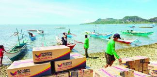 Department of Social Welfare and Development – Region 6 personnel, with the assistance of local residents and partner agencies, unload and transport family food packs to Barangay Gabi in Isla Gigantes, Carles, Iloilo as part of the agency’s “last mile” disaster preparedness initiative aimed at ensuring faster emergency response in geographically isolated island communities. DSWD-6
