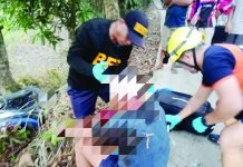 Personnel of the Bureau of Fire Protection (BFP)-Passi City apply first aid to a 27-year-old motorcycle driver who was found unconscious after crashing into a tree in Barangay Cadilang, Passi City, Iloilo early Tuesday morning, May 12. PHOTO BY BFP-PASSI CITY