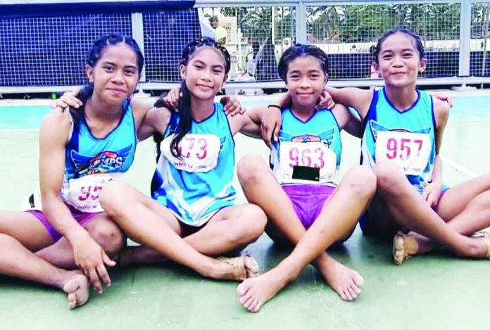 sports WV Palaro_compressed Members of Western Visayas’ record-breaking elementary girls’ 4x100-meter relay team — Trixia Anne Arellano, Maria Athena de Guiño, Norlyn Bedo, and Princesa Lyn Yanson — celebrate after setting a new Palarong Pambansa record of 51.79 seconds in Agusan del Sur. PHOTO COURTESY OF RAY CABARLES