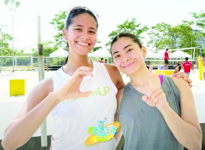 sports_BVR_copy_compressed_resized Pauline Gaston and Roma Mae Doromal during a Beach Volleyball Republic tournament. BVR PHOTO