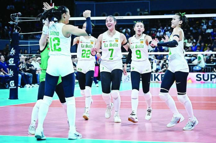 De La Salle University Lady Spikers moved within one win of capturing their 13th UAAP women’s volleyball championship after defeating defending champion National University Lady Bulldogs in Game 1 of the Season 88 Finals at the SM Mall of Asia Arena in Pasay City. UAAP PHOTO