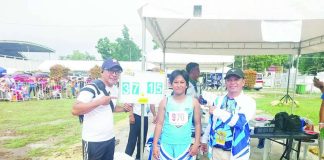 Althea Grace Prosperoso of Pototan, Iloilo celebrates after becoming the new Palarong Pambansa record holder in the elementary girls discus throw. PHOTO COURTESY OF REY CABARLES