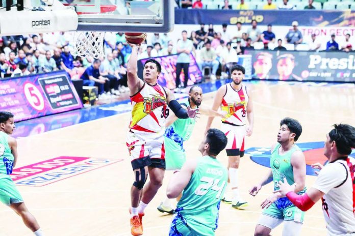 sports_SMB_compressed_resized Ilonggo Jericho Cruz of the San Miguel Beermen attacks the basket against the Phoenix Super LPG Fuel Masters during their PBA Commissioner’s Cup clash. PBA PHOTO