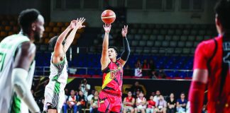 Ilonggo guard Jericho Cruz of the San Miguel Beermen fires a three-point shot during their Commissioner’s Cup victory over Terrafirma Dyip at the Ninoy Aquino Stadium. PBA PHOTO