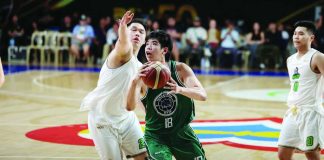 Terrafirma Dyip center Geo Chiu attacks his Macau Black Knights defender. PBA PHOTO