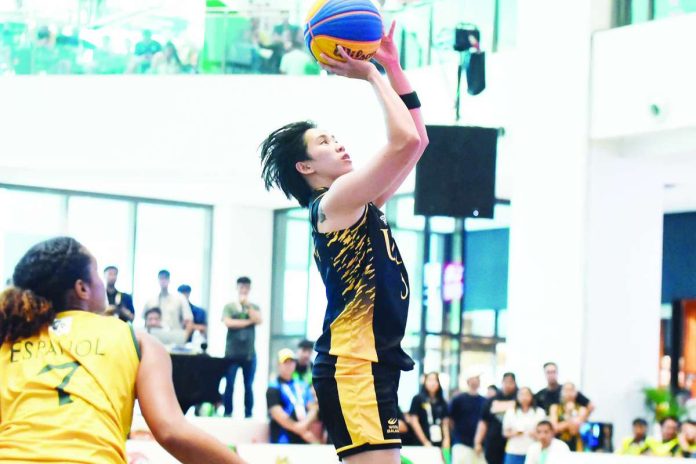 Negrense Kent Jane Pastrana of the University of Santo Tomas Growling Tigresses pulls up for a shot during the UAAP Season 88 women’s 3x3 basketball tournament. UAAP PHOTO