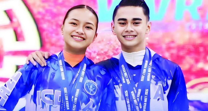 sports_WV_dance_compressed_resized Western Visayas dancesport standouts Andrei Villanueva and Ma. Victoria Cruz celebrate their six-gold medal haul in the youth division of the National PRISAA Games in Bacolod City. PHOTO COURTESY OF LGU PASSI