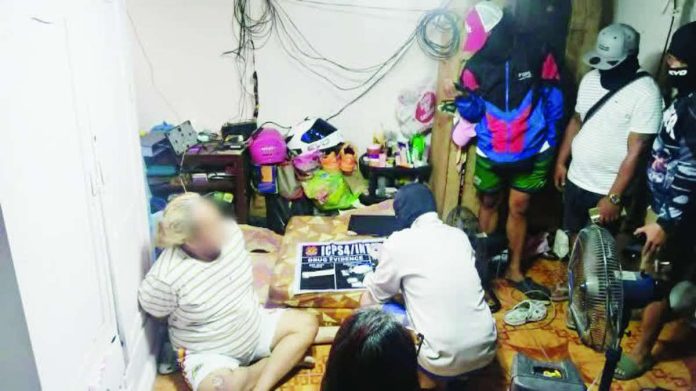 tanod_wife_drugs_compressed_resized Law enforcers arrested a barangay tanod and his wife, tagged as high-value suspects, and seized more than P1 million worth of alleged shabu on May 6 in Zone 3, Barangay San Juan, Molo, Iloilo City. ICPO PHOTO
