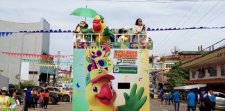 Pikoy, the official mascot of the Palawan Group of Companies, inspired by the endemic blue-naped parrot of Palawan, brought color and energy to the Baragatan Festival's float parade