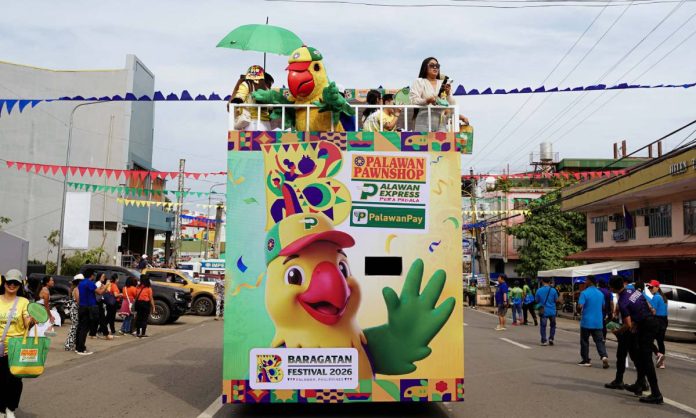 1---Baragatan-Festival Pikoy, the official mascot of the Palawan Group of Companies, inspired by the endemic blue-naped parrot of Palawan, brought color and energy to the Baragatan Festival's float parade