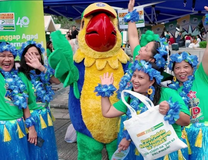 1---HK Pikoy, the beloved mascot of Palawan Group of Companies, brought energy and excitement to the festival through lively booth interactions.