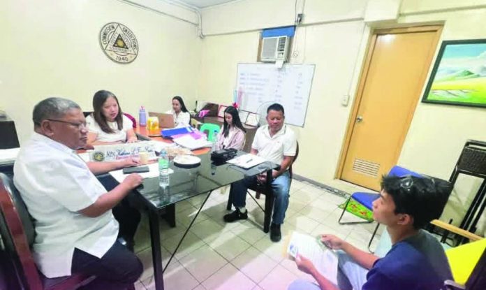Bacolod Comelec_compressed Members of the Election Registration Board (ERB) conducted hearings on voter registration applications filed during the April-May 2026 registration period at the Office of the Election Officer in Bacolod City. The hearing was presided over by City Election Officer Atty. Kathrina L. Trinio-Caña, together with Atty. Hermilo B. Pa-oyon of the Local Civil Registrar and Dennis G. Develos, Assistant Schools Division Superintendent-Officer-in-Charge, to verify and evaluate applications for inclusion in the city's voters' list. COMELEC BACOLOD CITY PHOTO