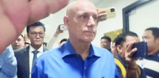 Resigned Ateneo De Manila University men’s basketball team head coach Tab Baldwin appears before the National Bureau of Investigation on June 23, 2026 in connection with the death of two of his players during a team-building activity.