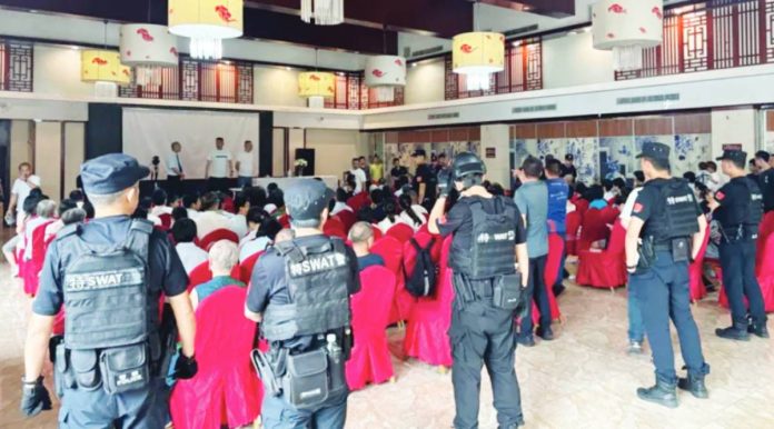 China Chinese police officers surround congregants seated on chairs midway through Sunday service at Early Rain Covenant Church. More than 30 members of the church were taken for interrogation. EARLY RAIN COVENANT CHURCH
