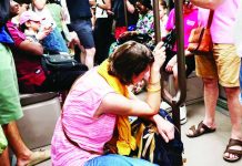 Red heat alerts issued in France, Italy and Spain as 40C temperatures forecast A woman sits on the floor of a crowded carriage on metro line 11 during a heatwave in Paris. The heatwave will be "widespread, long-lasting and intense", France's forecaster warned. GETTY IMAGES