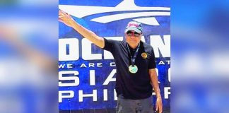 Engr. Bernan G. Certeza proudly shows his finisher's medal after completing the Oceanman qualifying race in Siargao, an achievement that continues to inspire Filipinos to pursue active and purposeful lives regardless of age.