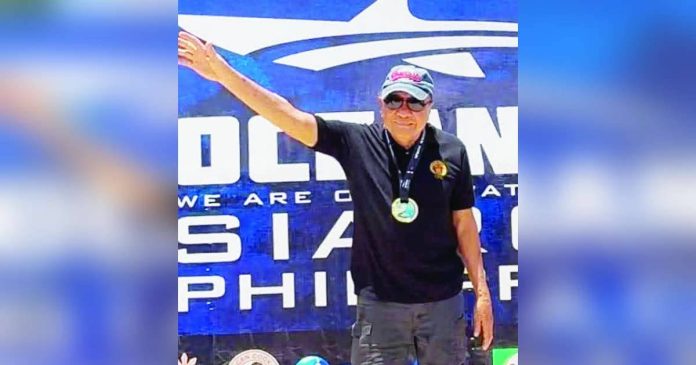 Father's legacy pic2.JPG_superimposed Engr. Bernan G. Certeza proudly shows his finisher's medal after completing the Oceanman qualifying race in Siargao, an achievement that continues to inspire Filipinos to pursue active and purposeful lives regardless of age.