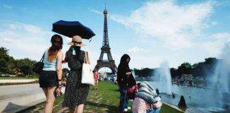 Forty-nine French regions have been placed under a red heatwave alert, including Paris. EPA
