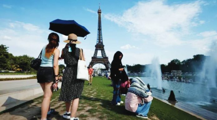France Forty-nine French regions have been placed under a red heatwave alert, including Paris. EPA