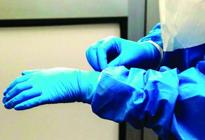 France_copy_compressed_resized Healthcare workers are at high risk of contracting Ebola so they must wear protective gear. GETTY IMAGES