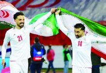Iran’s World Cup team lands in Mexico amid US visa row Iran’s players Omid Norafkan and Saman Ghoddos celebrate after a qualifying match. AFP VIA GETTY IMAGES