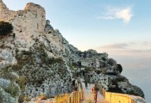 Israeli soldiers walk through the ruins of Beaufort Castle, whose keep stands high above them in the left of the picture. Beaufort Castle is a strategic fort in southern Lebanon. REUTERS