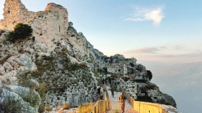 Israel Israeli soldiers walk through the ruins of Beaufort Castle, whose keep stands high above them in the left of the picture. Beaufort Castle is a strategic fort in southern Lebanon. REUTERS