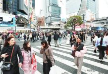 The Shibuya Crossing is one of Japan’s most famous tourist attractions. NURPHOTO VIA GETTY IMAGES