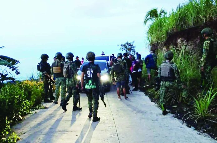 Negros_rebels_compressed_resized Personnel of the Police Regional Office-Negros Island Region (PRO-NIR) conducted scouring and clearing operations in Sitio Kabalagnan, Barangay Lalong, Calatrava, Negros Occidental, following an armed encounter between members of the Regional Mobile Force Battalion-NIR and suspected Communist Terrorist Group (CTG) members on June 14. Authorities recovered parts of a 5.56-caliber rifle during the operation. PRO-NIR PHOTO
