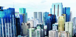 The Philippine economy grew by 2.8 percent in the first quarter of 2026. For the second and third quarters, De La Salle University economists project further weakening, with growth slowing to 2.5 percent and 2.2 percent, respectively. INQUIRER PHOTO / GRIG C. MONTEGRANDE