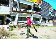 Sarangani earthquake death toll rises to 37; Over 1,000 aftershocks jolt Mindanao A responder prepares to take part in search and rescue operations outside a collapsed building in General Santos City on June 9, 2026. AFP
