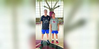 Ilonggo basketball standout Luke Rose of Pavia, Iloilo poses with Lyceum of the Philippines University–Cavite Junior Pirates head coach Chico Lanete after committing to join the NCAA juniors program. Rose, a 2025 Palarong Pambansa Mythical Team selection, is expected to suit up for the Junior Pirates beginning Season 102. CONTRIBUTED PHOTO