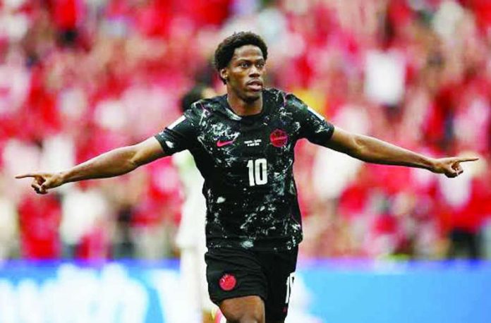 Sports_Canada_copy_compressed_resized Canada’s Jonathan David celebrates after completing a hat-trick in the Canadians’ dominant 6-0 victory over Qatar in a FIFA World Cup 2026 Group B match at BC Place in Vancouver, Canada. PHOTO BY JARED C. TILTON/GETTY IMAGES