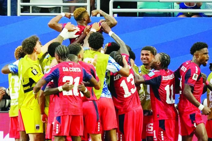 Sports_Cape_compressed_resized Kevin Pina celebrates after scoring Cape Verde’s historic first-ever FIFA World Cup goal during the Islanders’ 2-2 draw against Uruguay in Group H action. PHOTO COURTESY OF SPRINGFIELD NEWS