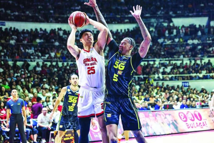 Sports_PBA_compressed_resized Barangay Ginebra San Miguel Kings’ Japeth Aguilar attempts a shot against the defense of TNT Tropang 5G import Chris McCullough during the PBA Season 50 Commissioner’s Cup Finals. The two teams meet tonight in a winner-take-all Game 7 for the conference championship. PBA Photo. PBA PHOTO