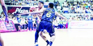 Nard John Pinto celebrates after delivering two clutch fourth-quarter three-pointers that helped power Barangay Ginebra San Miguel to an 88-76 Game 7 victory over TNT Tropang 5G and the PBA Season 50 Commissioner’s Cup championship. PBA PHOTO