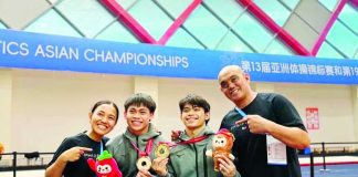 Philippine gymnasts Carlos Edriel Yulo (center) and Karl Eldrew Yulo (right) celebrate a historic double podium finish after winning the gold and bronze medals, respectively, in the men's floor exercise final of the 2026 Asian Men's Artistic Gymnastics Championships in Zunyi, China. GAP PHOTO