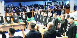 Individuals identifying themselves as former Philippine Marines take their oath at the start of the Senate’s blue ribbon committee hearing on June 4, 2026.
