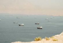 Hormuz tension affects 421 Filipino seafarers; 2 killed in latest attack Vessels in the Strait of Hormuz, as seen from Oman on June 18, 2026. REUTERS