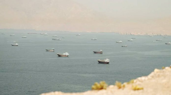 US Vessels in the Strait of Hormuz, as seen from Oman on June 18, 2026. REUTERS