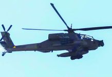 This picture taken from a position in northern Israel, on the border with southern Lebanon, shows an Israeli Air Force AH-64 Apache helicopter flying on June 4, 2026. GETTY IMAGES