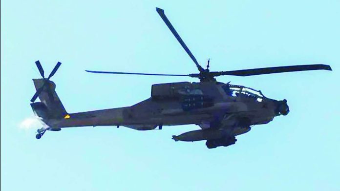 US_copy_compressed_resized This picture taken from a position in northern Israel, on the border with southern Lebanon, shows an Israeli Air Force AH-64 Apache helicopter flying on June 4, 2026. GETTY IMAGES